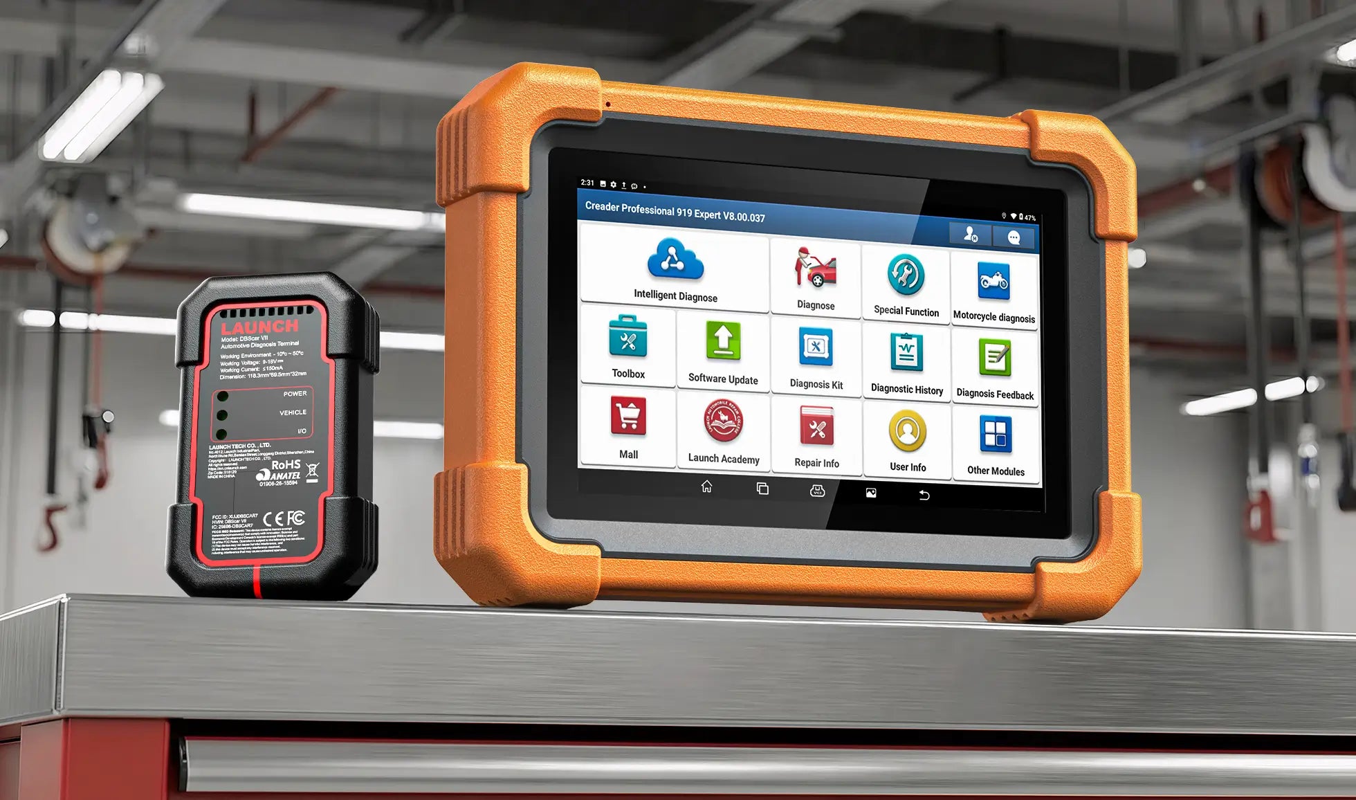 A LAUNCH Creader Professional 919 Expert diagnostic scanner enclosed in a rugged orange protective bumper, sitting on a metallic workshop surface. It is positioned next to a black wireless VCI connector.